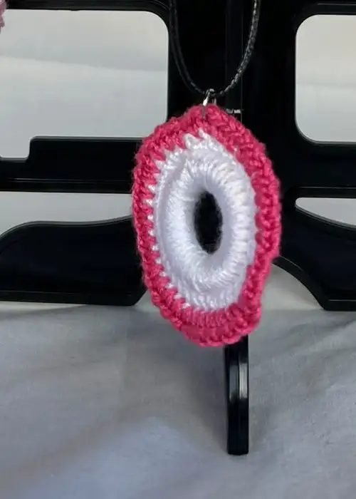 Foto 2 von 2: Set aus Ohrringen und Halskette in Rosa und Weiß