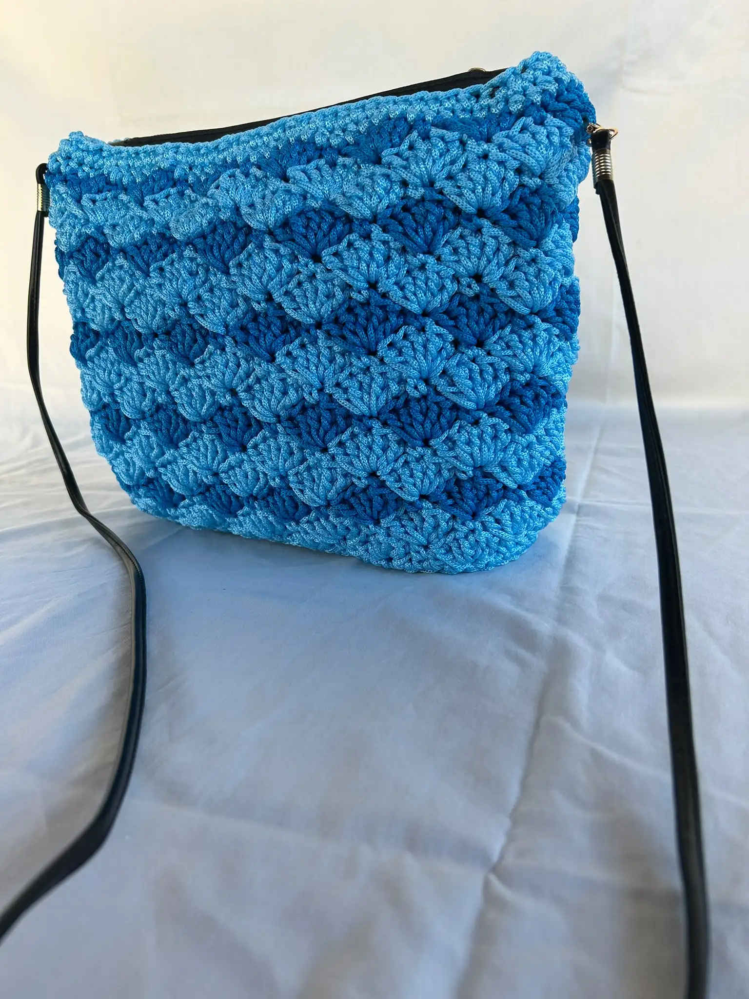 Foto 4 de 4: Mala tiracolo azul às ondas